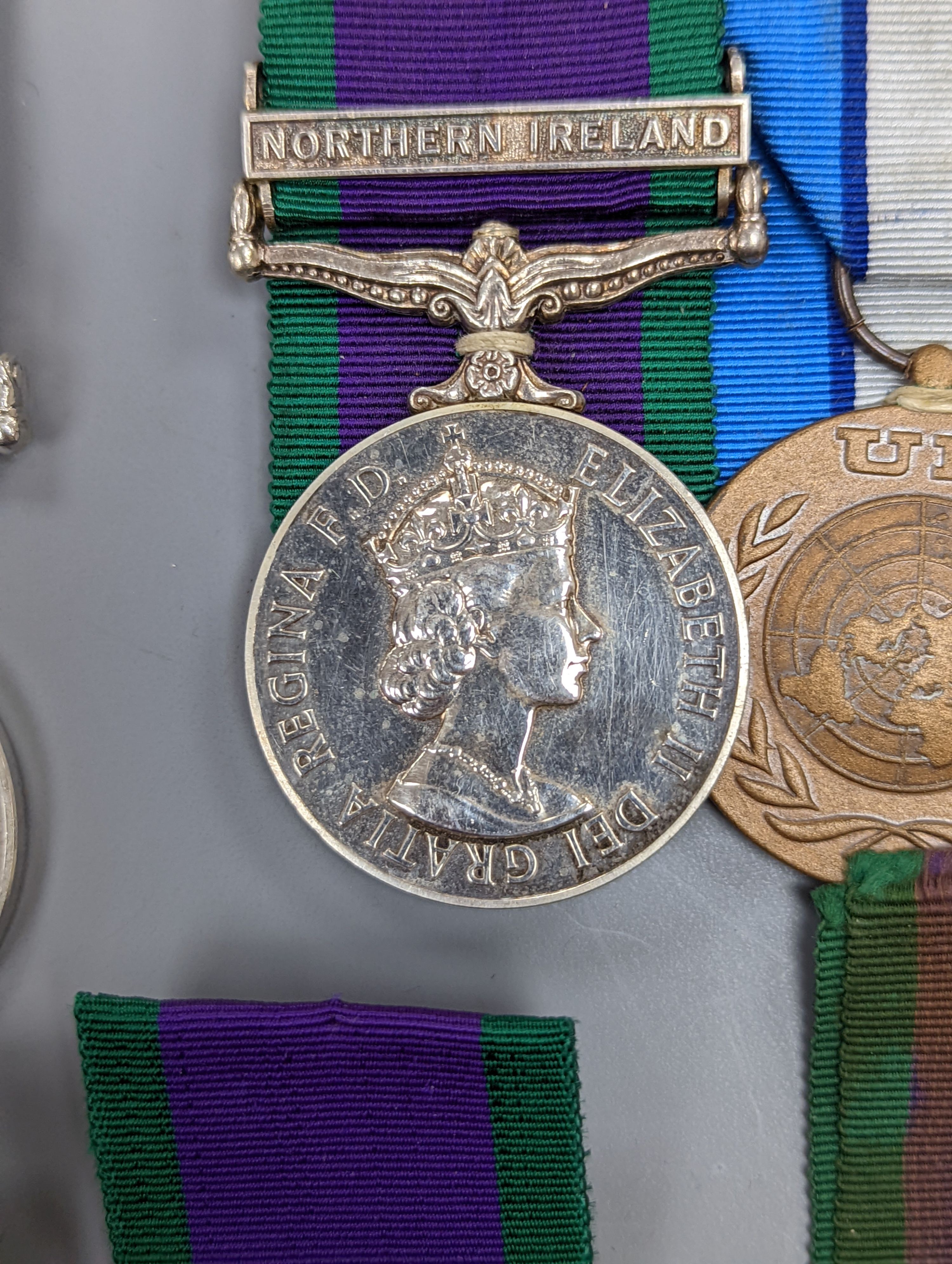 Five QEII GSM, three with a Northern Island clasp (one with UN medal), and two with South Arabia clasps